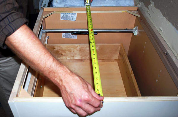Competitor Measuring with Tape Measure